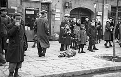 A body lying in the street of the Warsaw Ghetto in the General Governorate